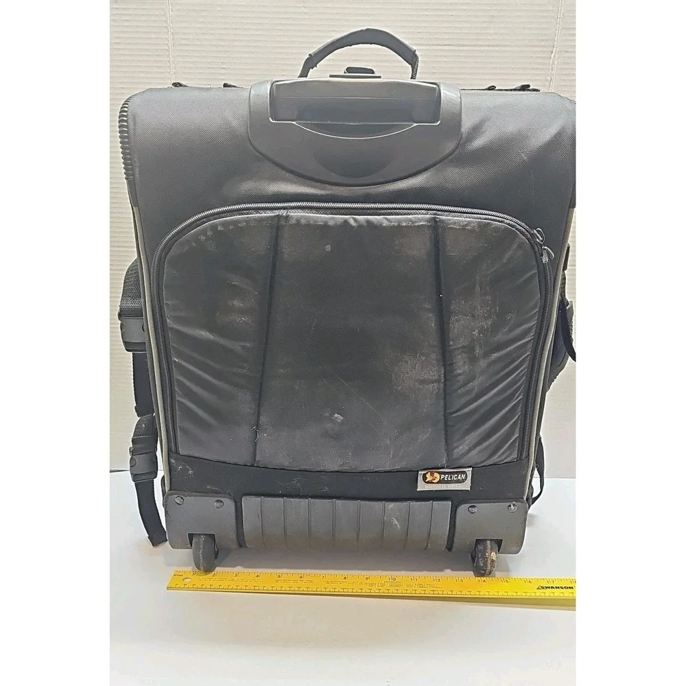 Pelican rolling camera/lighting case, semi rigid, laptop etc. pockets